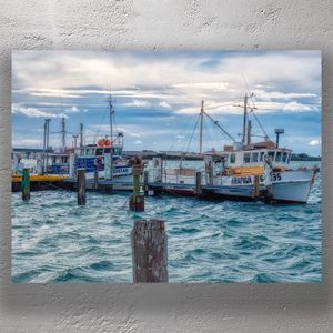 Fishing Boats Docked at Windy Waterfront Harbor Photo Download
