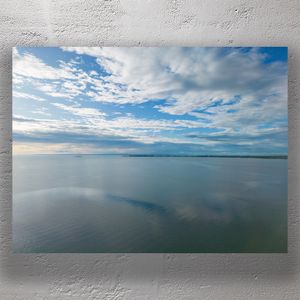 Serene Ocean Horizon Under a Cloud-Kissed Sky Tranquil Coastal Landscape Photo Download
