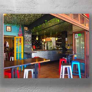 Colorful Tapas Bar with Rooftop Vibes in a Vibrant Urban Setting Photo Download