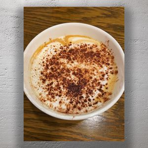Delicious Chocolate-Dusted Cappuccino Creamy Espresso with Cocoa Topping Photo Download