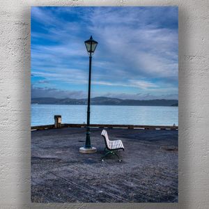 Waterfront View with Bench and Lamp Post Coastal Tranquility Photography Photo Download