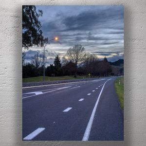 Countryside Road at Dusk with Street Light and Dramatic Sky Peaceful Rural Landscape Photo Download