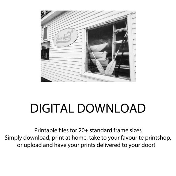 Vintage Boat Shed Exterior with Canoes and Paddles Photo Download