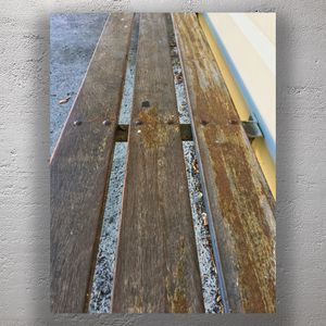 Weathered Wooden Bench Close-Up Rustic Outdoor Seating Texture with Natural Patina Photo Download