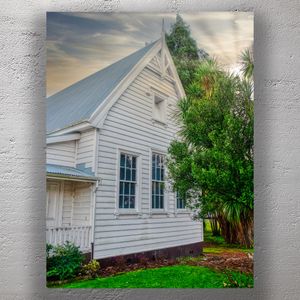 Charming Historic White Weatherboard Church with Steep Gable Roof at Sunset Photo Download