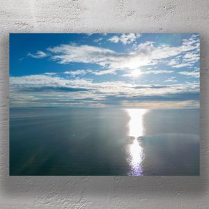 Tranquil Ocean View with Stunning Sunlight Reflection Serene Seascape Photo Download