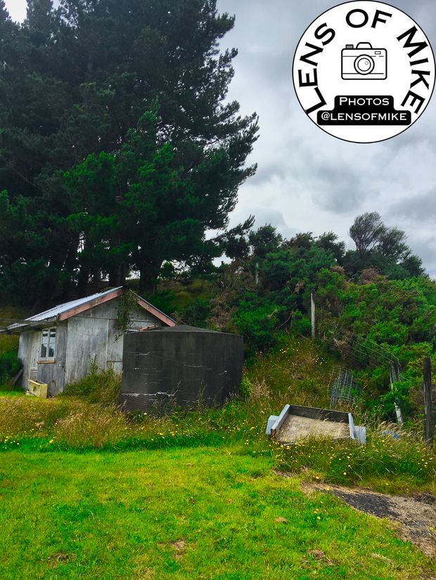 Abandoned Farm Shed with Water Tank in Rural Landscape Rustic Countryside Scene Photo Download
