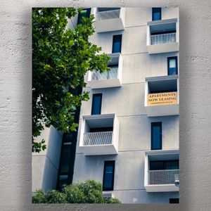 Modern Apartment Building with Balconies Urban Architecture and Leasing Opportunity Photo Download