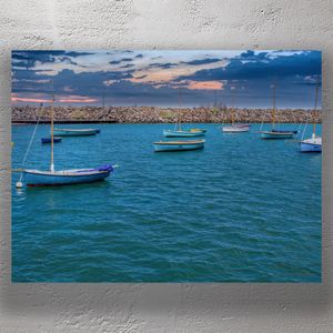 Tranquil Small Boats on Calm Blue Waters Photo Download