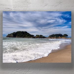 Moturiki Island at Mount Maunganui Beach with Ocean Waves and Dramatic Sky Photo Download