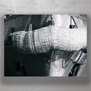 Close-Up of Tugboat Bow with Heavy Mooring Rope and Chains Photo Download
