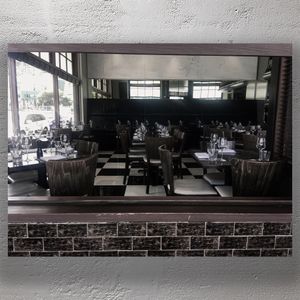 Modern Elegant Restaurant Interior with Chic Black and White Decor Photo Download