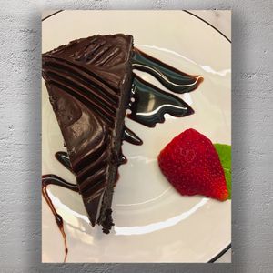 Decadent Chocolate Cake Slice with Strawberry and Drizz Photo Download