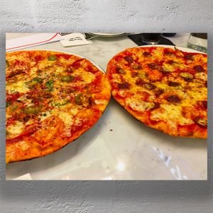 Delicious Thin Crust Pizzas Spicy Chicken and Pepperoni Feast Photo Download