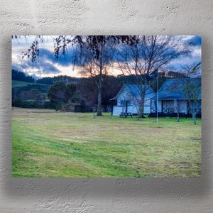 Peaceful Rural Motel Grounds at Sunset Countryside Accommodation with Rustic Charm Photo Download