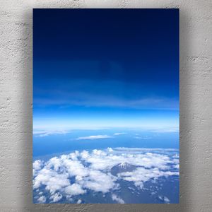 Aerial View of Mount Taranaki Emerging Above the Clouds Photo Download