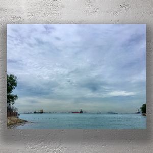 Serene Seascape with Cargo Ships Sentosa Island Singapore Photo Download