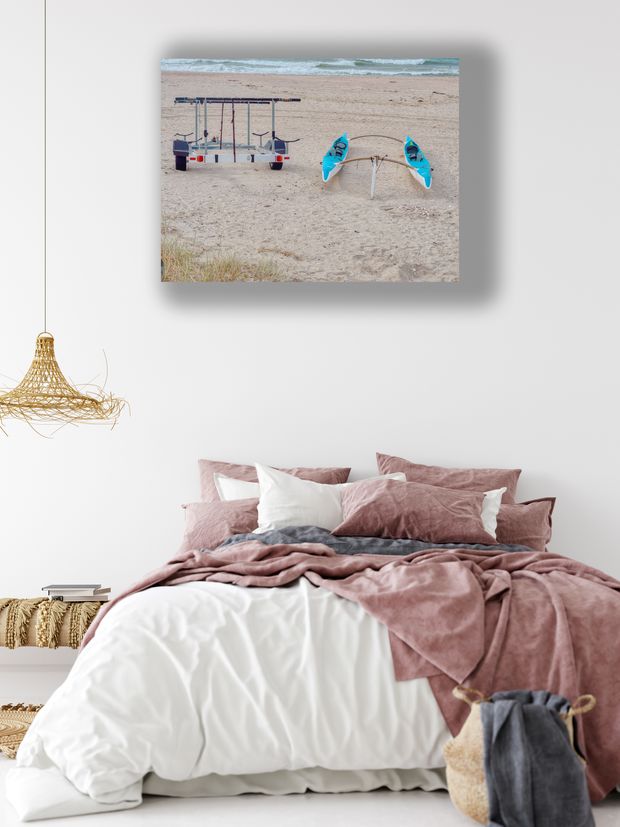 Twin Outrigger Canoes on Sandy Beach with Trailer by the Ocean Photo Download