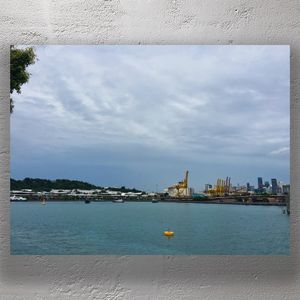 Waterfront View of Singapore Port with City Skyline and Sentosa Island Photo Download