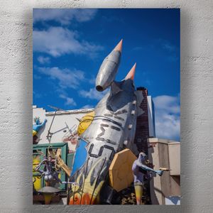 Retro Sci-Fi Rocket Crash Sculpture Futuristic Art Installation with Alien Figures Photo Download