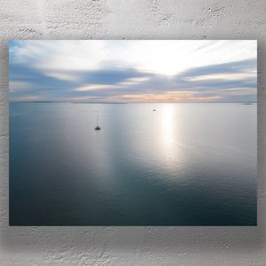 Catamaran at Sunrise on Calm Ocean Aerial Coastal Serenity Photo Download