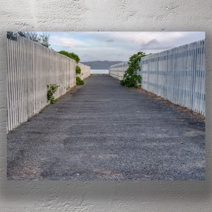 Rona Bay Wharf Eastbourne Scenic Coastal Pathway with Symmetrical Fences Photo Download
