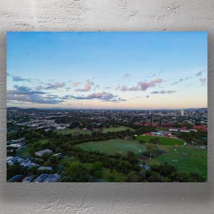 Aerial View of Norman Park Brisbane at Sunrise Scenic Cityscape and Greenery Photo Download