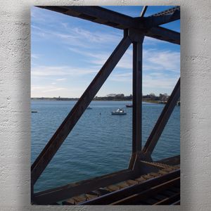 Boats on Tauranga Harbour Framed by Steel Railway Bridge Structure Photo Download