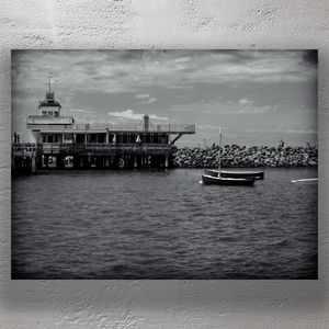 Serene Black and White Seascape of St Kilda Pier with Small Boats Photo Download