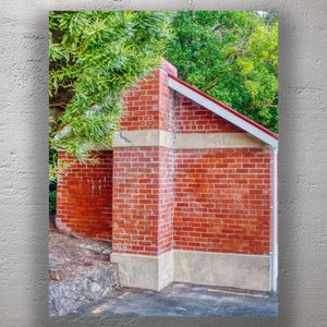Red Brick Architecture with Lush Greenery Photo Download