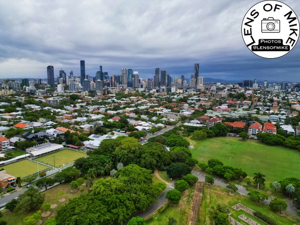 Aerial View of Brisbane City Skyline from New Farm Park Urban and Green Landscape Photo Download