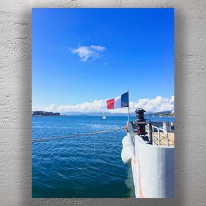 French Naval Flag on Ship in Wellington Harbour Under Clear Blue Sky Photo Download