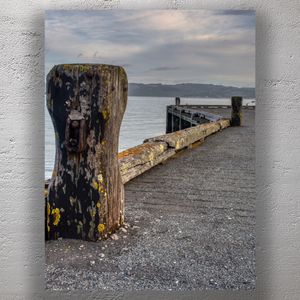 Weathered Wooden Pier with Lichen by Tranquil Waters Rustic Coastal Landscape Photo Download