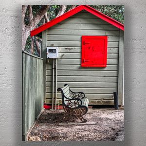 Rustic Charm Weathered Wooden Shed with Bold Red Accents and Vintage Bench Photo Download