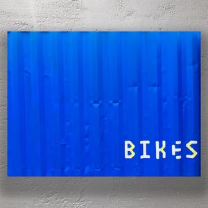 Bold Blue Shipping Container with BIKES Sign Urban Cycling Photo Download