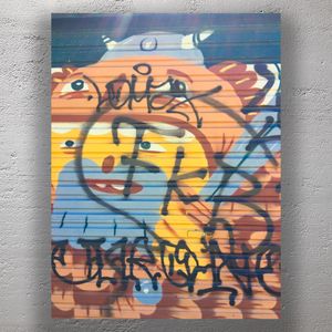 Urban Street Art Vibrant Graffiti on a Steel Door Photo Download