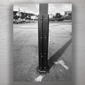 Urban Symmetry Black Steel Post and Shadow in Wellington Waterfront Photo Download