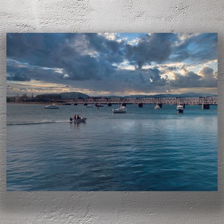 Boats on Tauranga Harbour with Historic Rail Bridge at Sunset Photo Download
