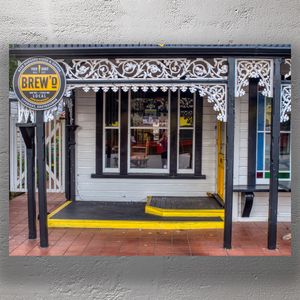 Charming Café and Bar with Vintage Architecture Photo Download
