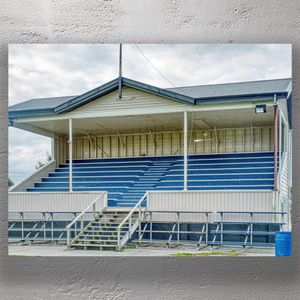 Vintage Wooden Grandstand at Local Sports Field Classic Bleacher Seating Photo Download