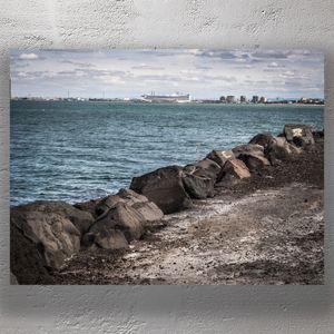 Melbourne Coastline with Cruise Ship in Port Ocean View and Rocky Shore Photo Download