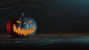 Halloween pumpkin on a black background. Carved pumpkin for Halloween