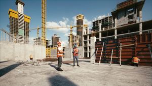 Workers in hard hats work at a construction site