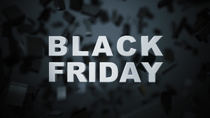 White text Black Friday on shopping bags background