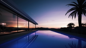 Private modern villa and pool at dusk