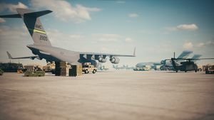 Loading military equipment at the airport. Military Airport