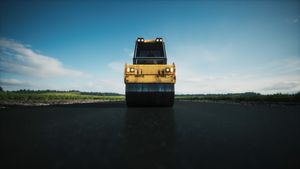 Asphalt paver machine on a road construction site