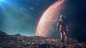 Astronaut on the red planet background