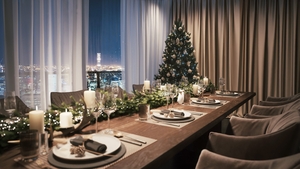  Evening table setting with Christmas decorations in the living room