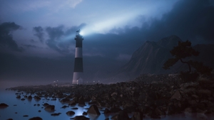 Lighthouse light on the stone shore at night